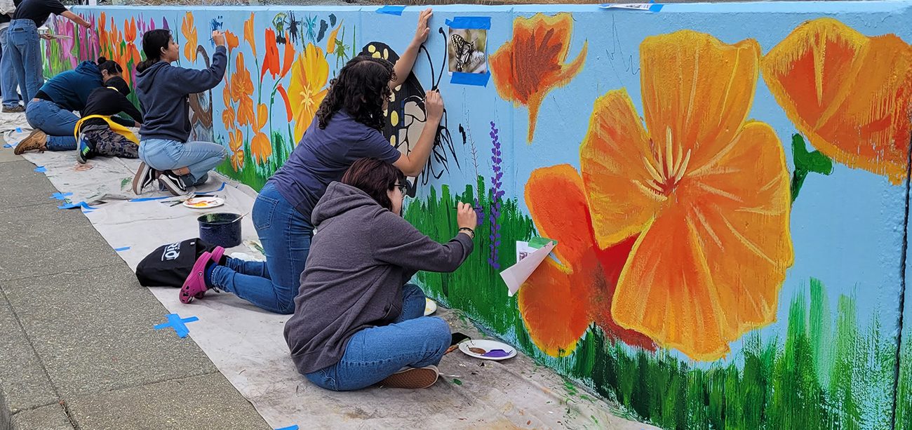 painting a mural on appian way in el sobrante, ca